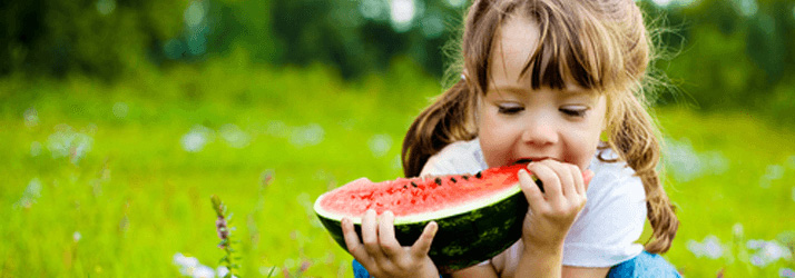 Chiropractic Winnebago IL Child With Watermelon